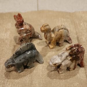 Set of Four Stone Dinosaur Figurines